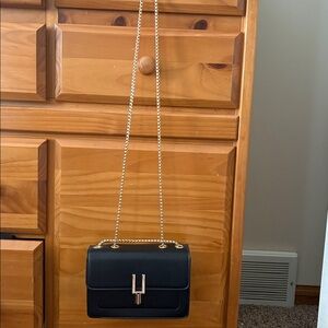 Black and gold shoulder/ arm bag